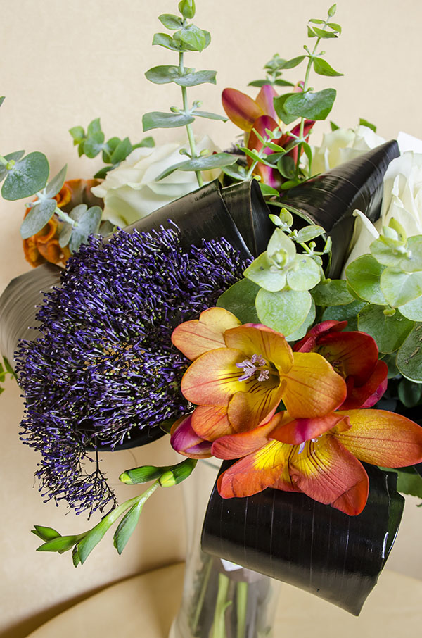 Bouquet roses, Trachelium, freesias, Cordyline and eucalyptus leaves