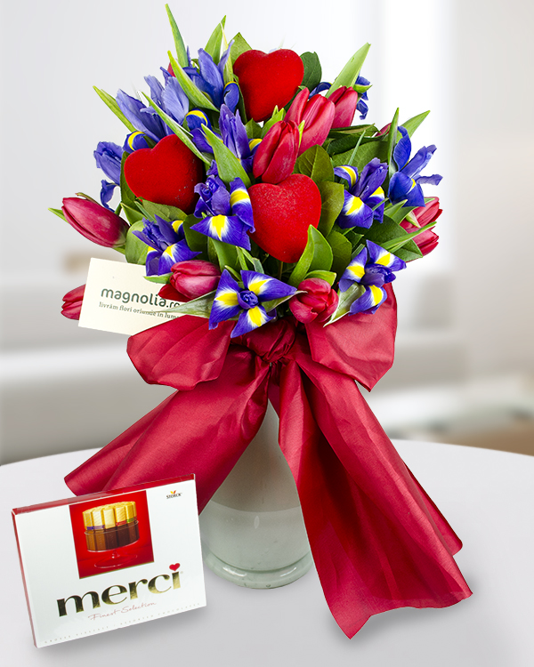 Bouquet of irises tulips and Merci chocolate