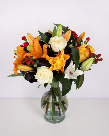 Bouquet of lilies and hypericum