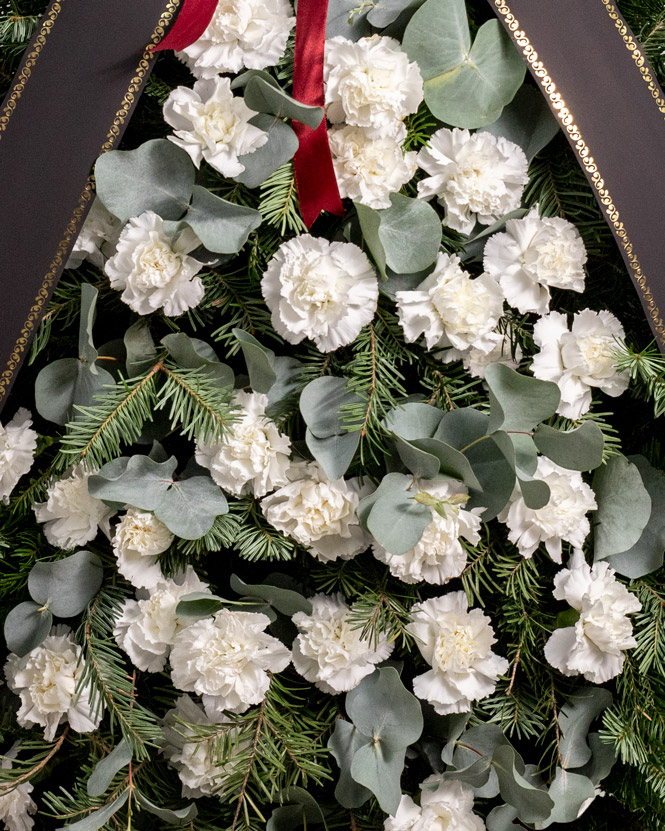 Funeral spray with 30 white carnations