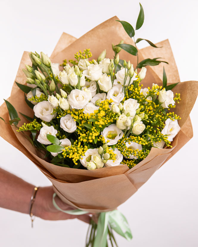 Crown of white flowers and bouquet for schoolf awards ceremony