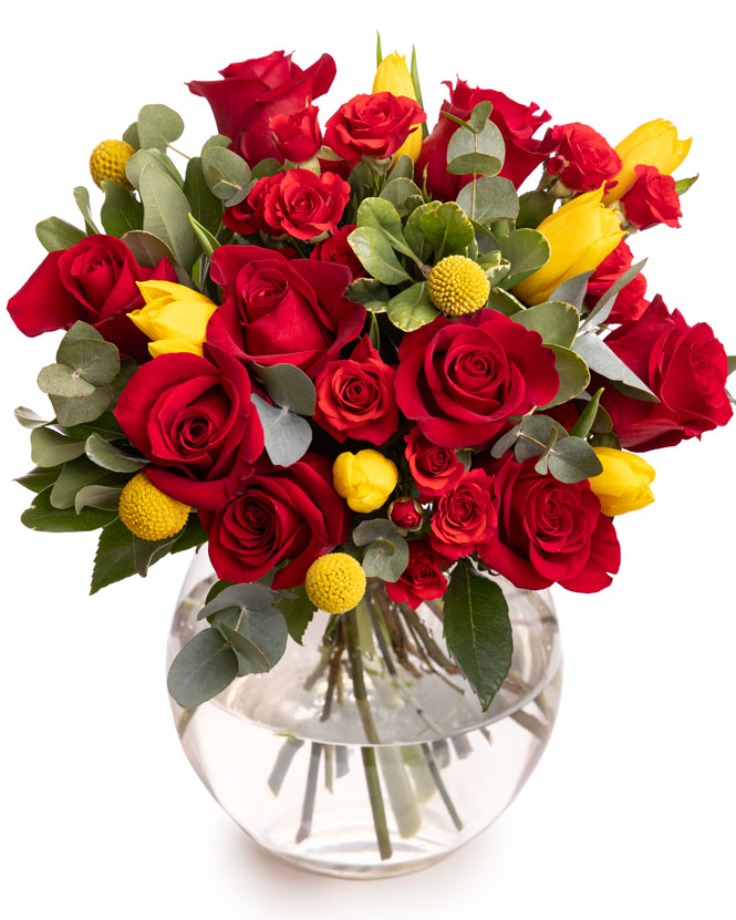 Bouquet with red roses, tulips and craspedia