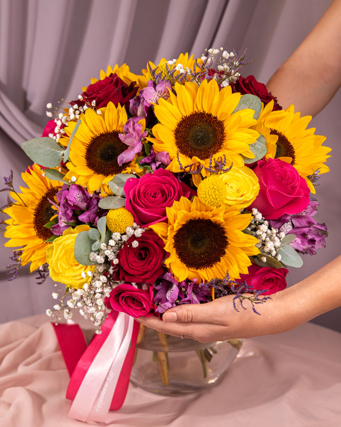 Colorful bouquet with sunflowers and roses