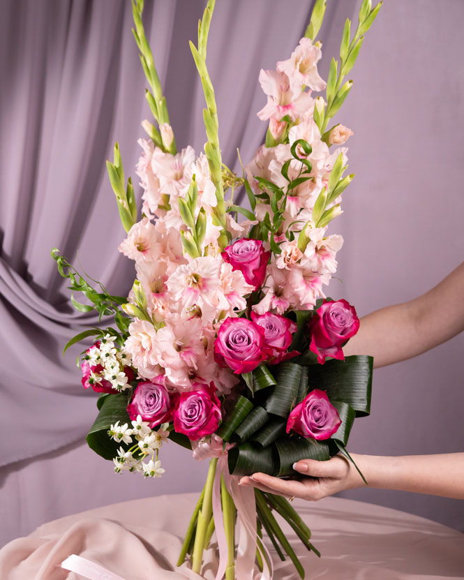 Gladioli and rose bouquet