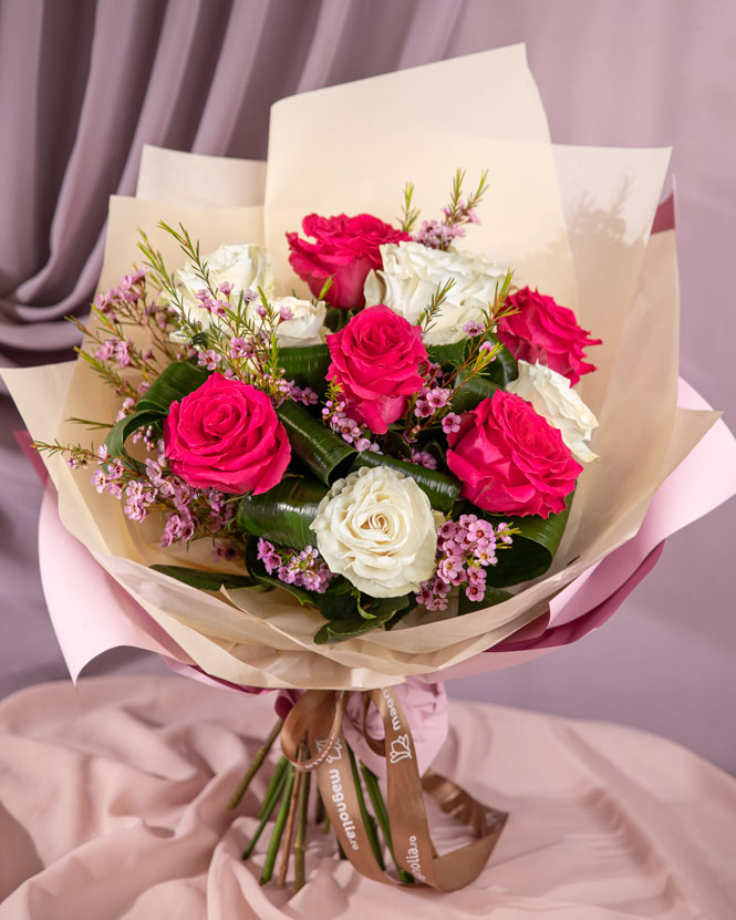 Delicate bouquet with roses