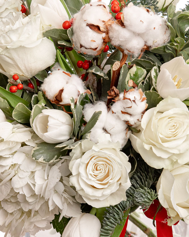 Bouquet of tulips and winter decorations