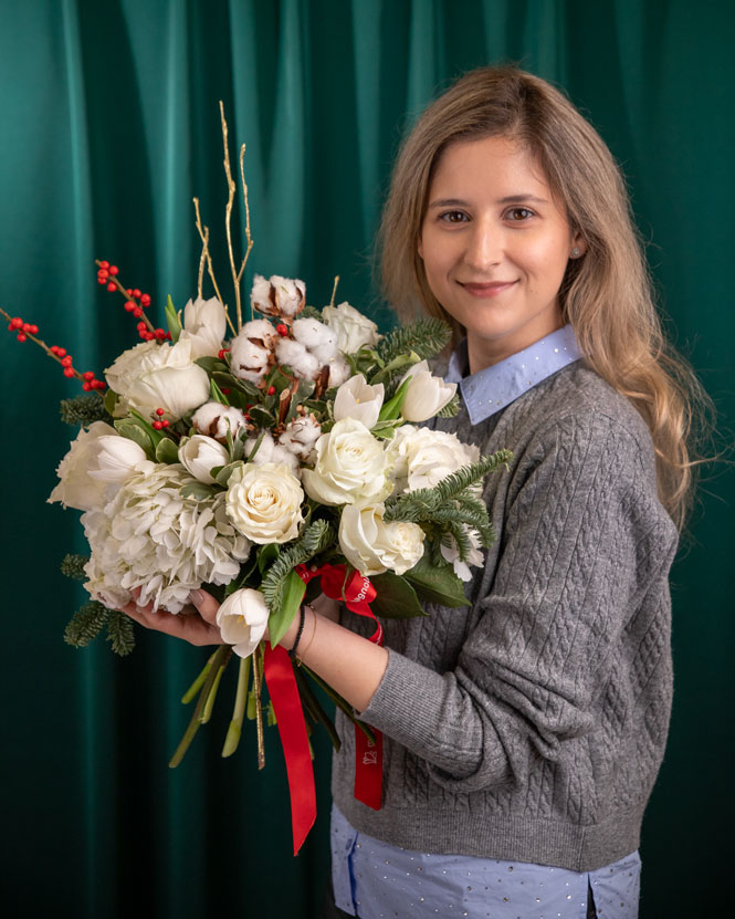 Bouquet of tulips and winter decorations