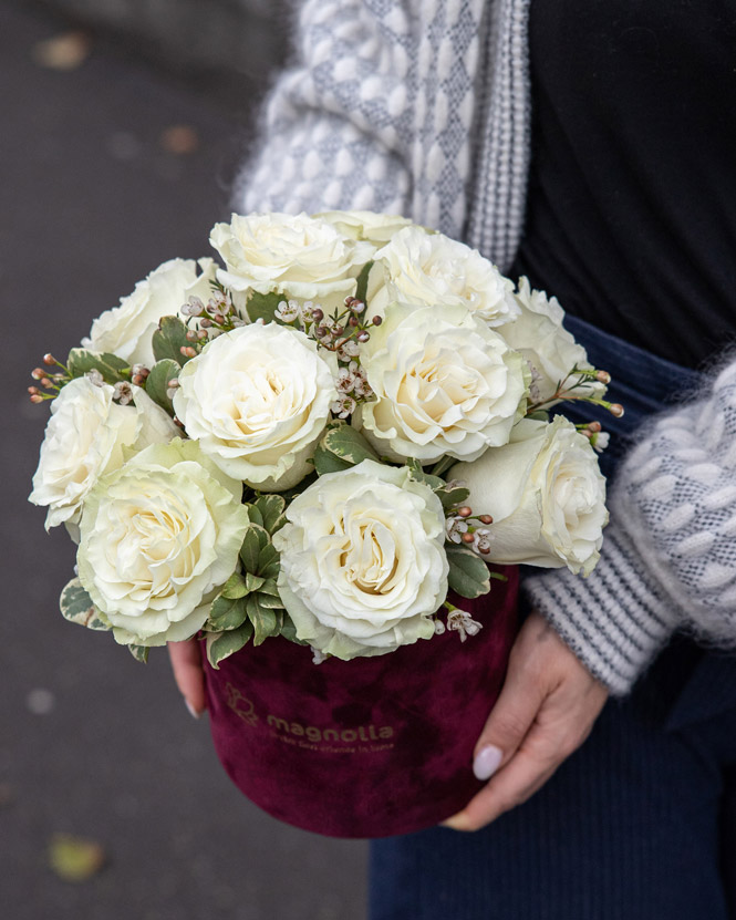 White roses arrangement in velvet box